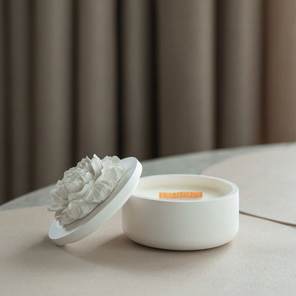 scented candle with peony flower